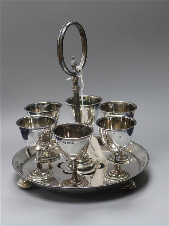 An Edwardian silver egg cruet, Sheffield, 1902, 27.5 oz.